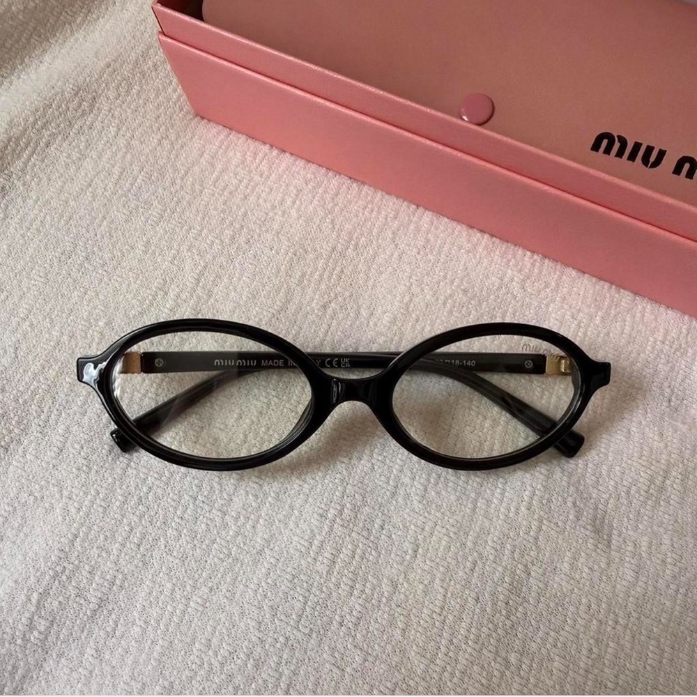 Miu Miu Black Oval glasses